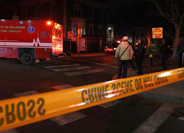 Emergency personnel gather at Hope and Waterman Streets at Brown University in Providence, R.I., Saturday, Dec. 13, 2025, during reports of a shooting.