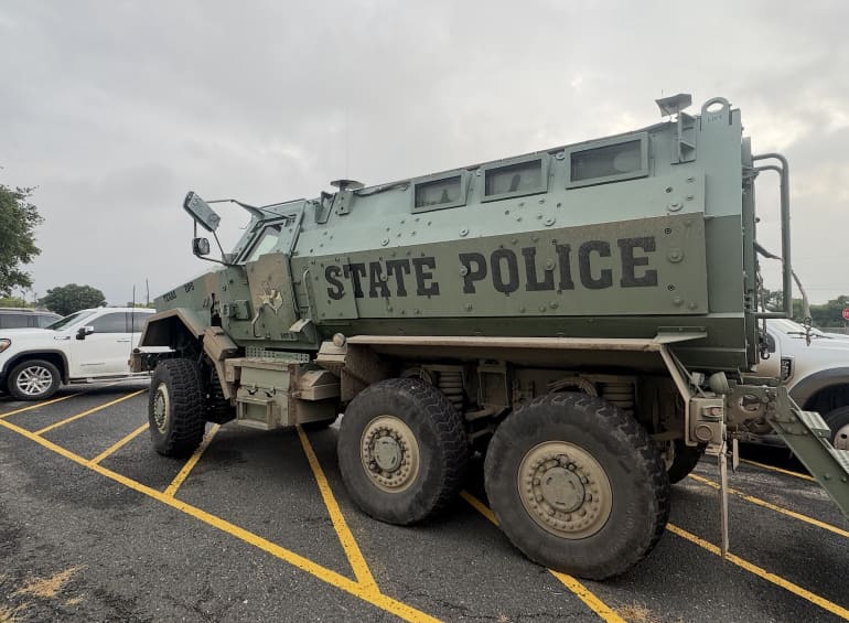 A state police truck parked outside