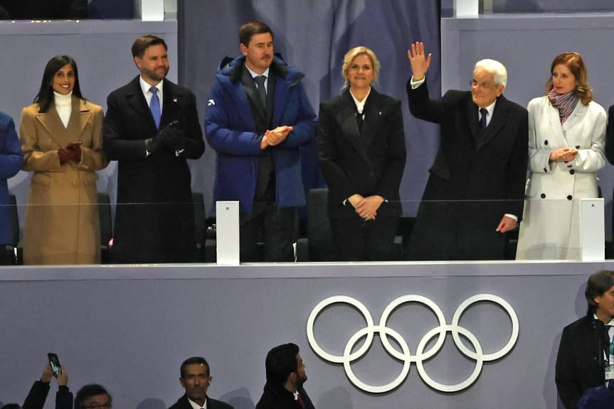 Italian President Sergio Mattarella, wave to the crowd during the opening ceremony.