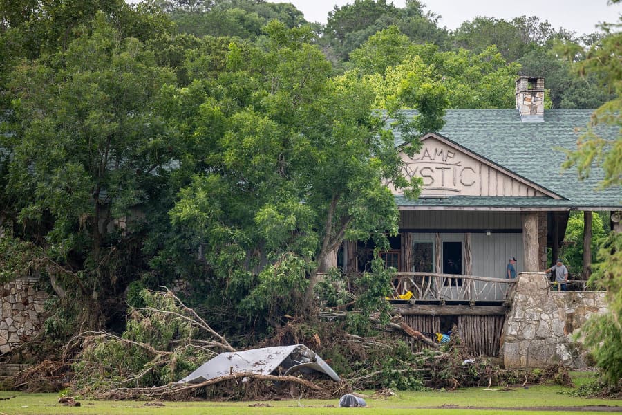 Debris is piled up at the entrance to Camp Mystic on July 7, 2025 in Hunt, Texas.