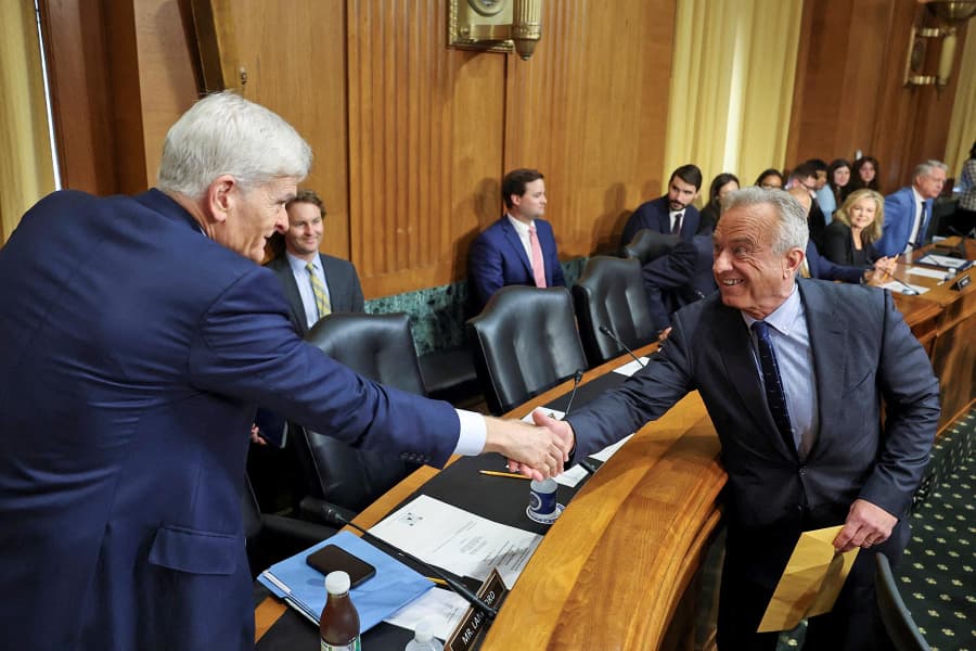 Health and Human Services Secretary Robert F. Kennedy Jr., greets Sen. Bill Cassidy, R-La., as he arrives to testify before a Senate Finance Committee hearing September 4, 2025. 
