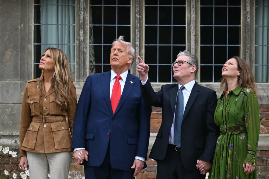 First lady Melania Trump, President Donald Trump, Britain's Prime Minister Keir Starmer and Victoria Starmer watch a display by members of the Red Devils parachute team at Chequers, in Aylesbury, central England, on September 18, 2025.