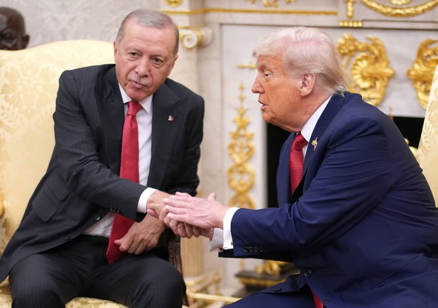 President Donald Trump shakes hands with President of Turkey Recep Tayyip Erdogan during a meeting in the Oval Office at the White House on September 25, 2025.