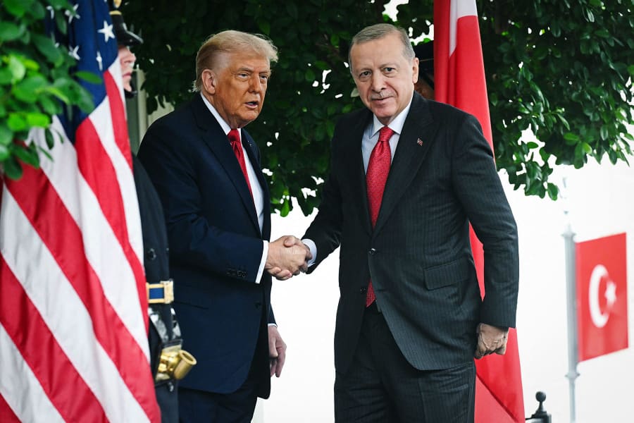 President Donald Trump greets Turkey's President Recep Tayyip Erdogan