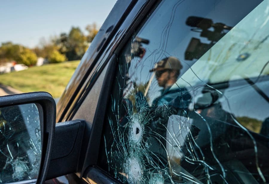 Bullet holes in the vehicle where the driver was shot after the attack on the The Church of Jesus Christ of Latter-day Saints.
