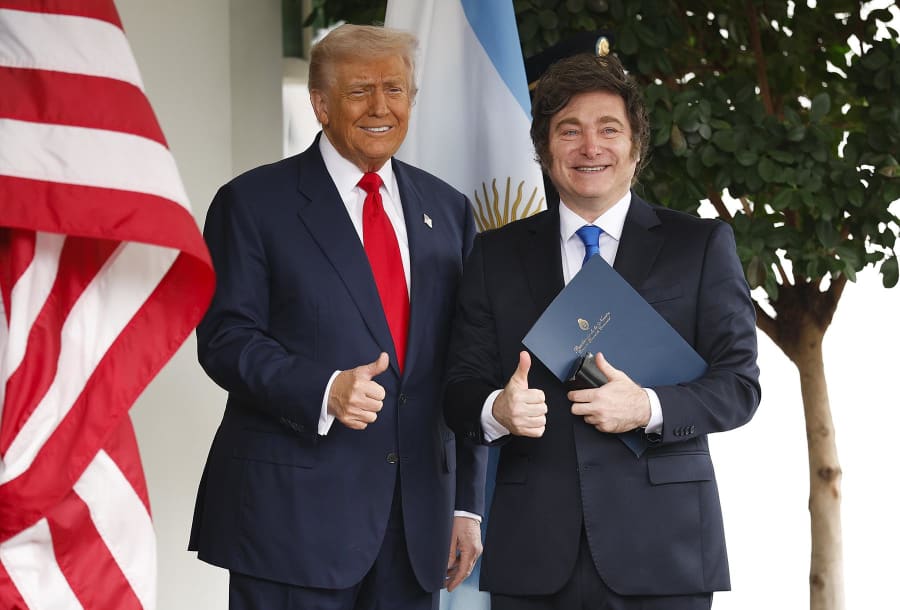 President Donald Trump greets Argentine President Javier Milei at the White House on Oct. 14, 2025.