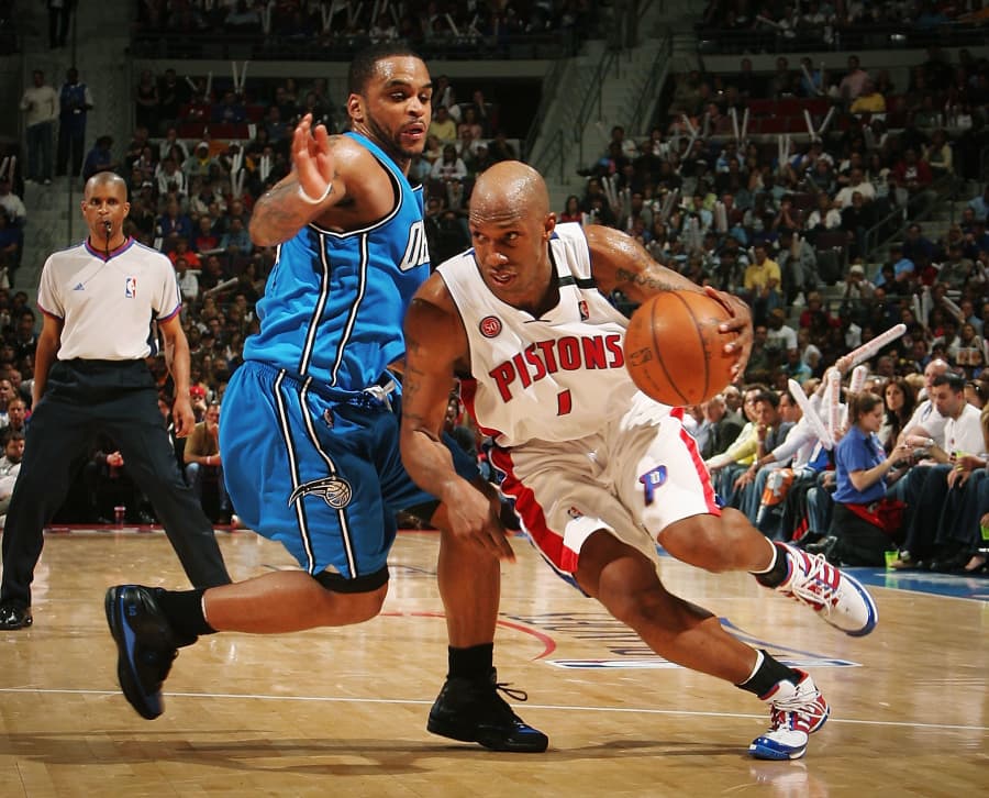 Chauncey Billups of the Detroit Pistons drives against Jameer Nelson of the Orlando Magic in 2008.