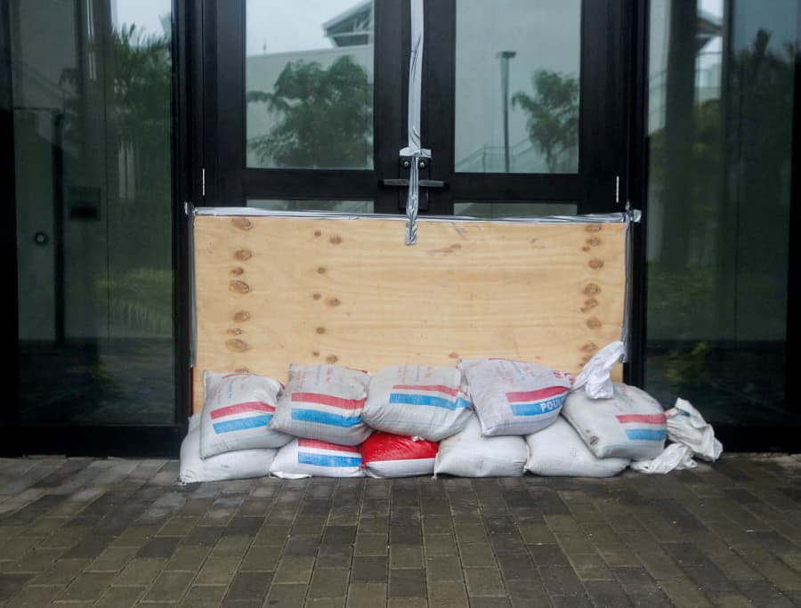 Sandbags are placed at the doors of AC Hotel Kingston, as Hurricane Melissa is expected to make landfall in Kingston, Jamaica, Oct. 28, 2025. 