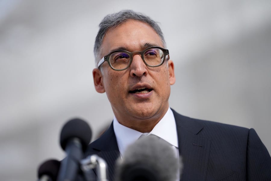 Attorney Neal Katyal speaks outside the Supreme Court