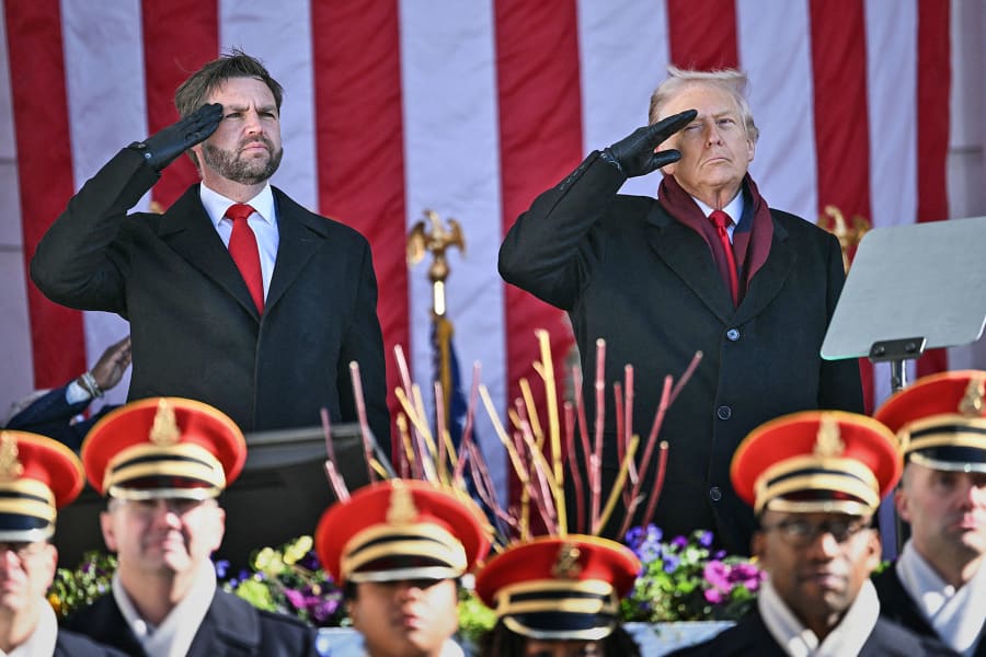 President Donald Trump and Vice President JD Vance salute at the conclusion of a Veterans Day ceremony at Arlington National Cemetery in Arlington, Va., on Nov. 11, 2025. 