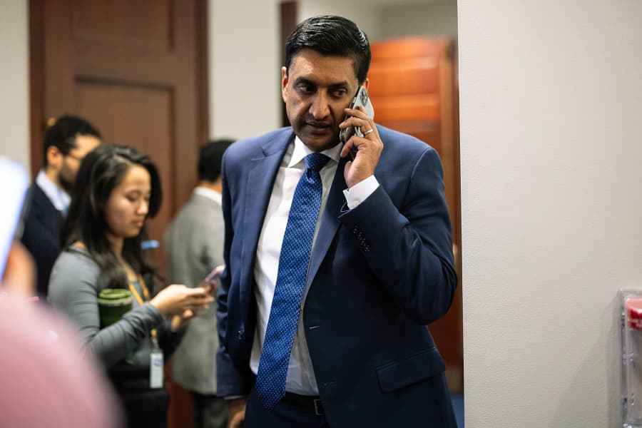 Rep. Ro Khanna, D-Calif., speaks on a phone as he departs a House Democratic Caucus meeting on Capitol Hill on Nov. 12, 2025. 