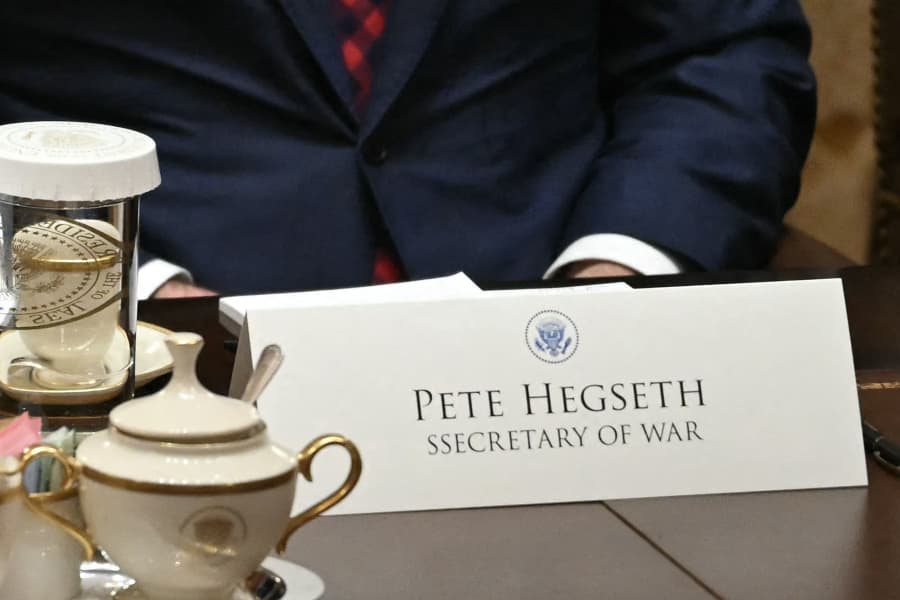 Defense Secretary Pete Hegseth's nameplate during a Cabinet meeting on Dec. 2, 2025.