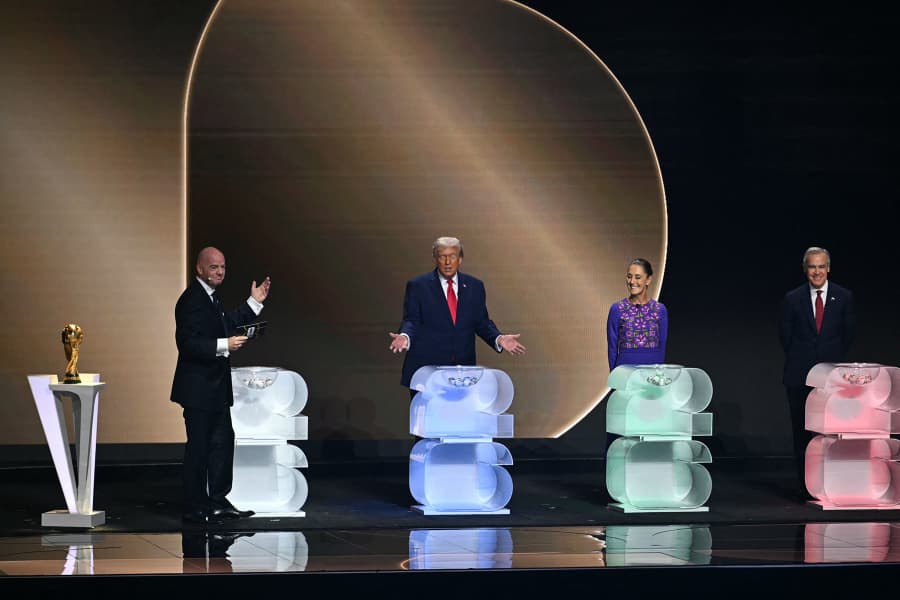 From left, Italian Fifa President Gianni Infantino, President Donald Trump, Mexico's President Claudia Sheinbaum and Canada's Prime Minister Mark Carney stand on stage during the draw for the 2026 FIFA Football World Cup at the Kennedy Center on Dec. 5, 2025.