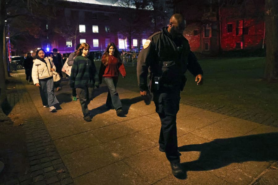 Brown University students are escorted by police