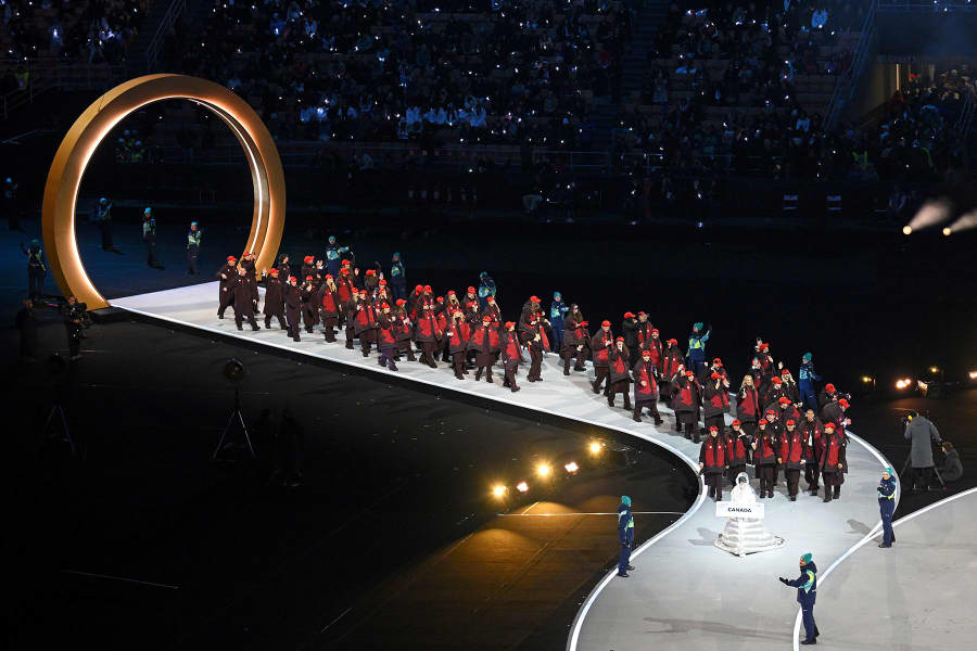 Athletes of Team Canada enter the stadium.