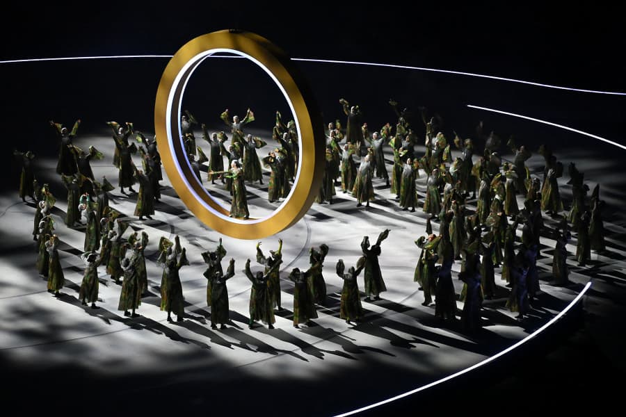 Dancers perform during the opening ceremony of the Milano Cortina 2026 Winter Olympic Games at the San Siro stadium in Milan, northern Italy, on February 6, 2026. 