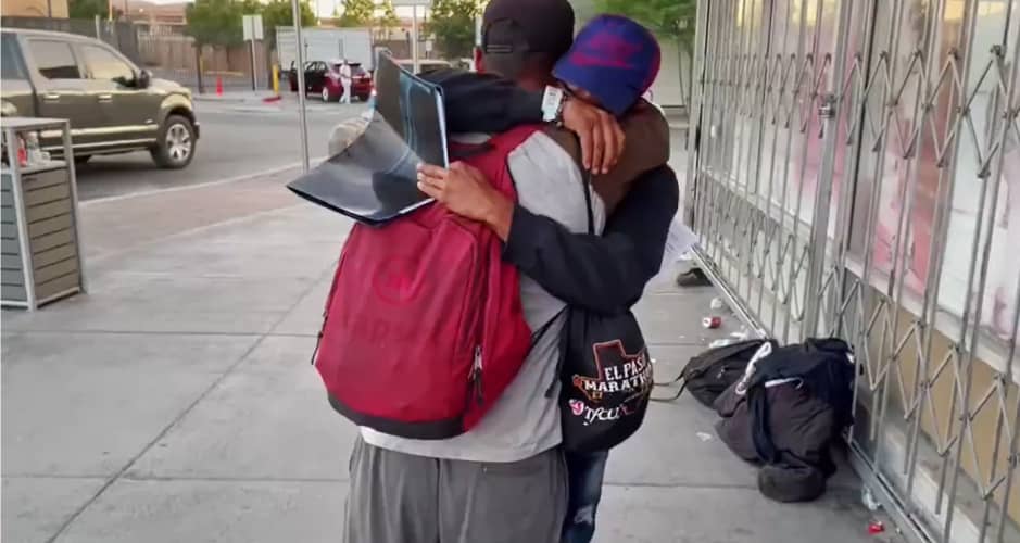 In El Paso, a father and son from Venezuela hug after they were allowed to stay in the U.S. and given a date to start the process to petition for asylum.