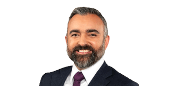 Portrait photo of Raul Torrez