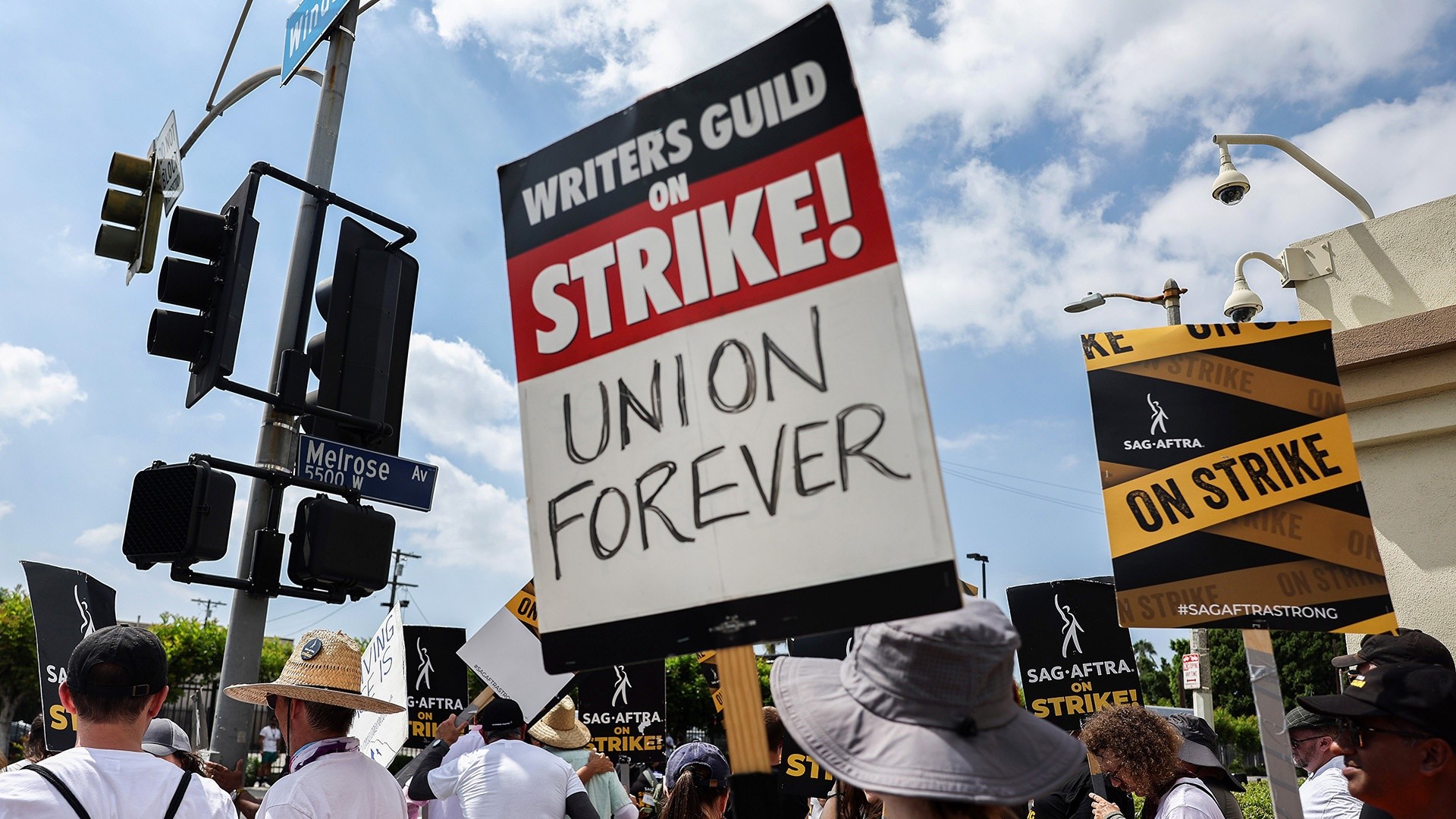Writers Guild, Hollywood studios reach tentative deal to end strike