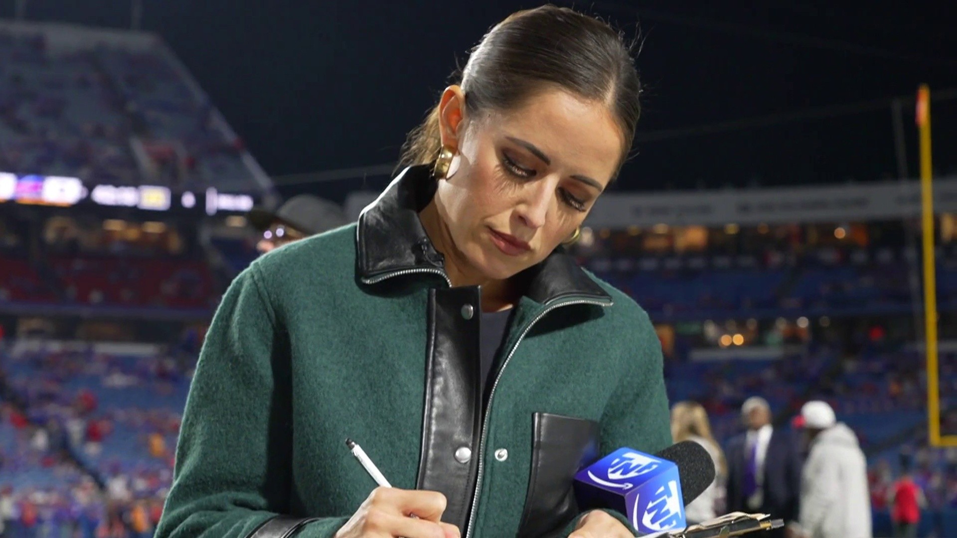 What's it like to report from the NFL sidelines? Get an inside look
