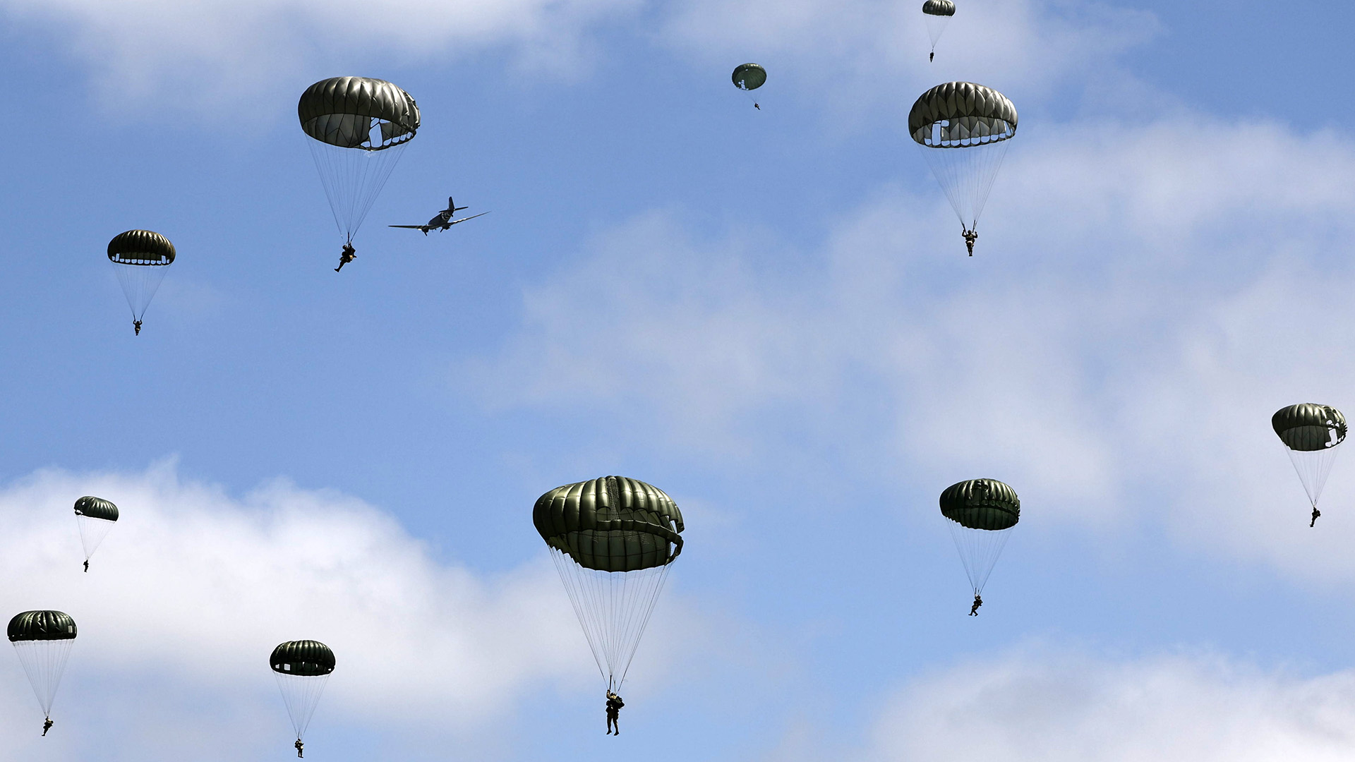 WATCH: Parachutists leap from WWII-era planes over Normandy to mark D ...