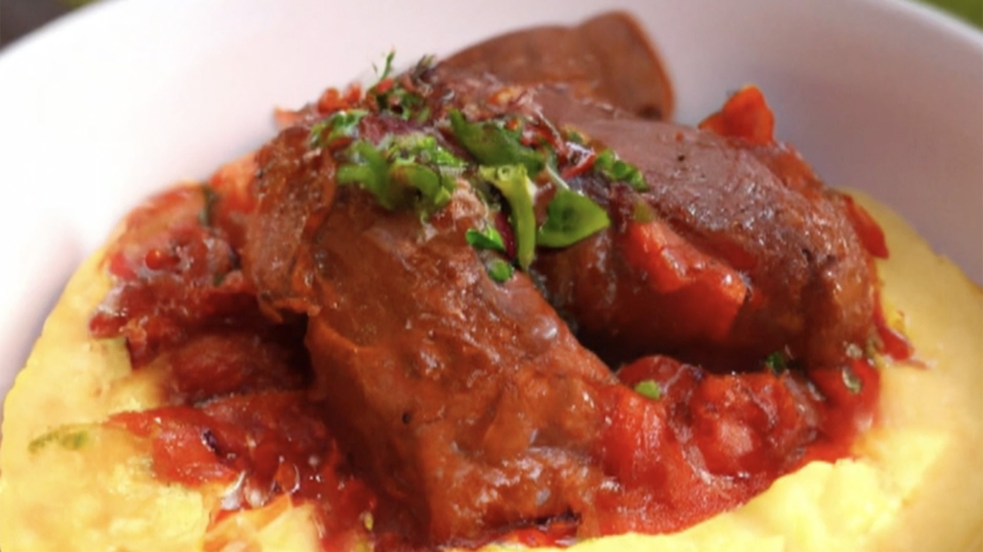 Smoked beef grillades over cheddar grits: Get the recipe!