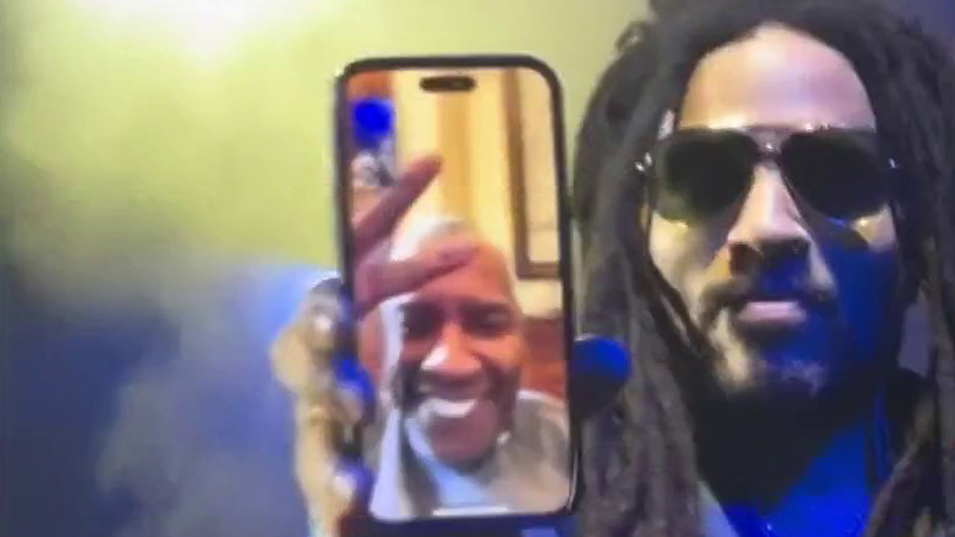 Lenny Kravitz takes FaceTime from Denzel Washington mid-show!