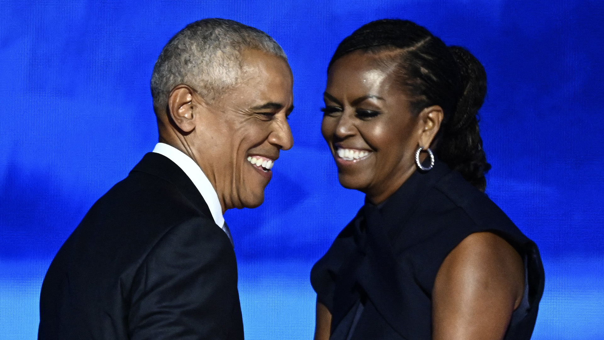 Obamas fire up audience during passionate speeches at DNC