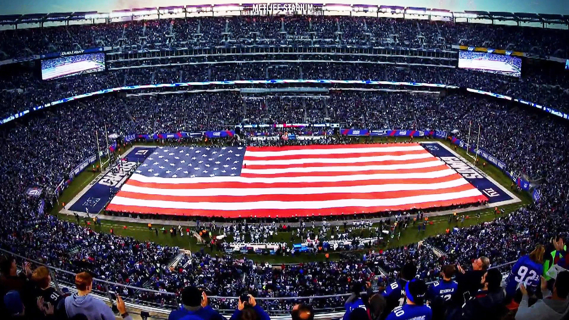 Inside the Giants' beloved tradition of rolling out the American flag