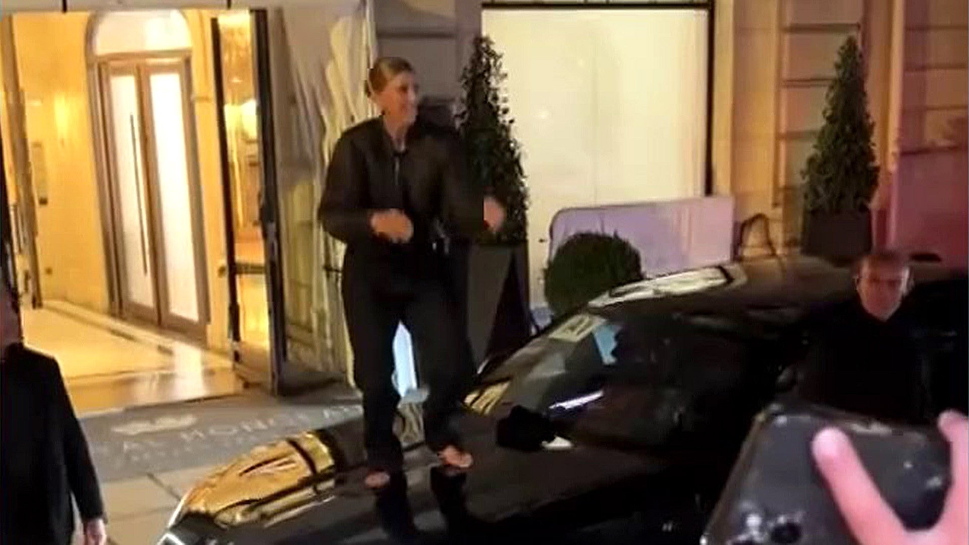 Céline Dion Climbs Onto Car Barefoot and Sings With Fans
