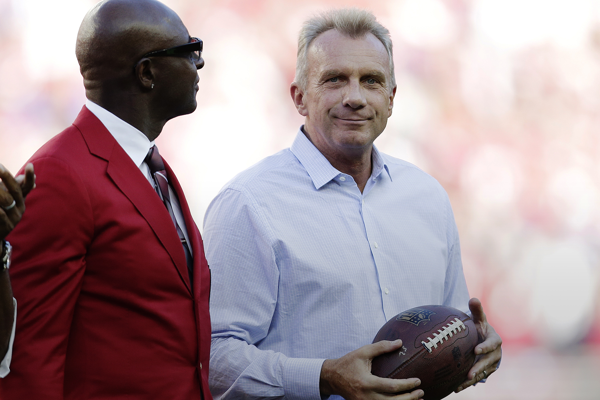 Auction of Joe Montana's first TD ball unearths family feud over which is  the real ball