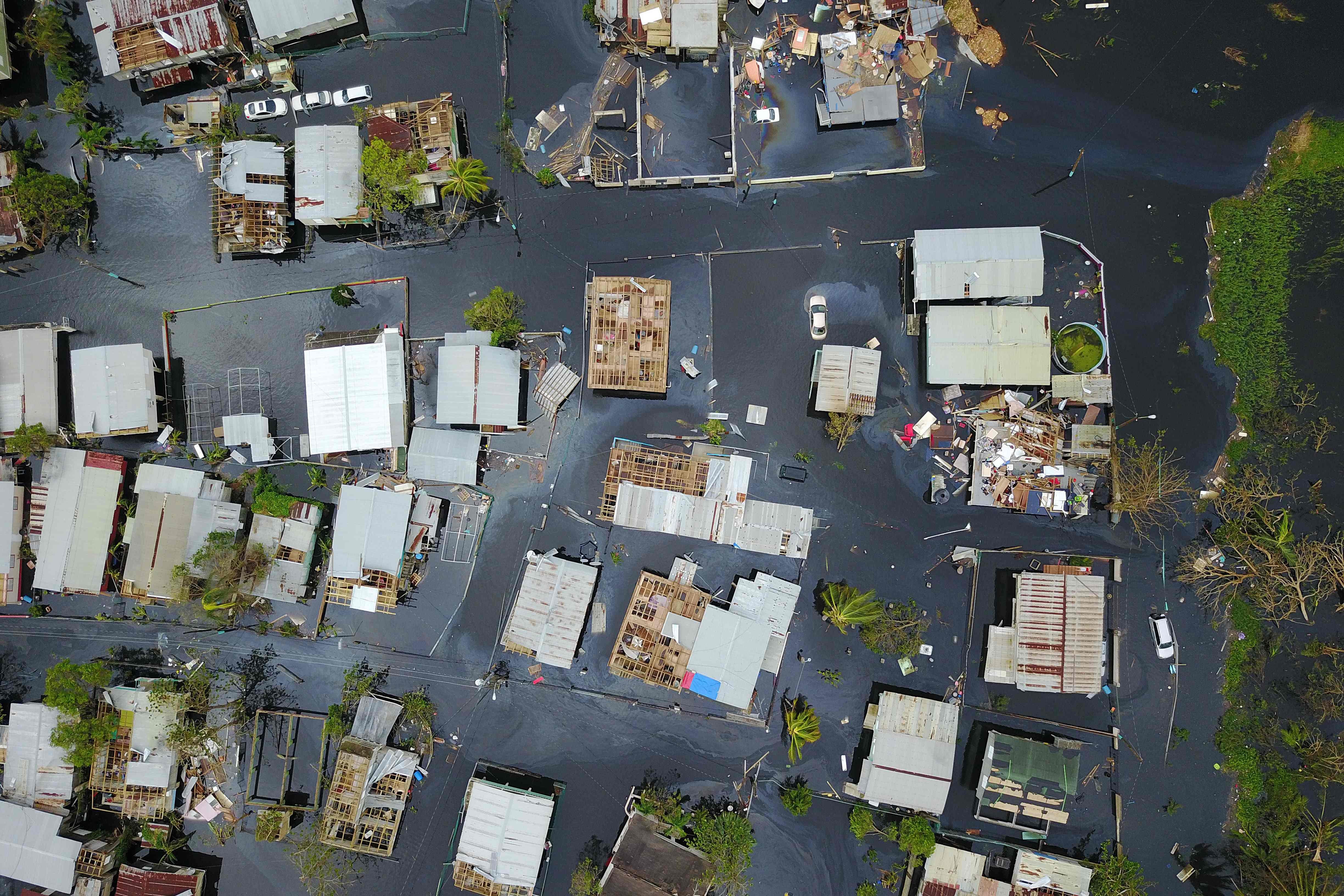 Hurricane Maria: Puerto Rico raises official death toll from 64 to 2,975, Hurricane Maria