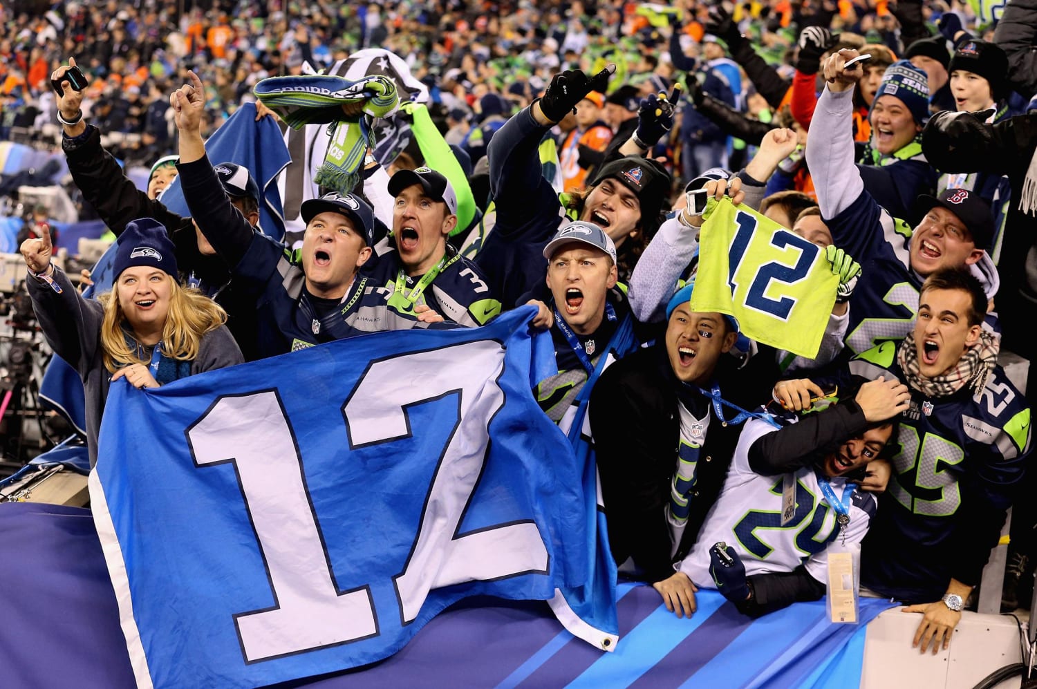 A group of Seattle Seahawks fans celebrate the win following the Super Bowl  XLVIII at MetLife Stadium in East Rutherford, New Jersey on February 2,  2014. The Seattle Seahawks whipped the Denver