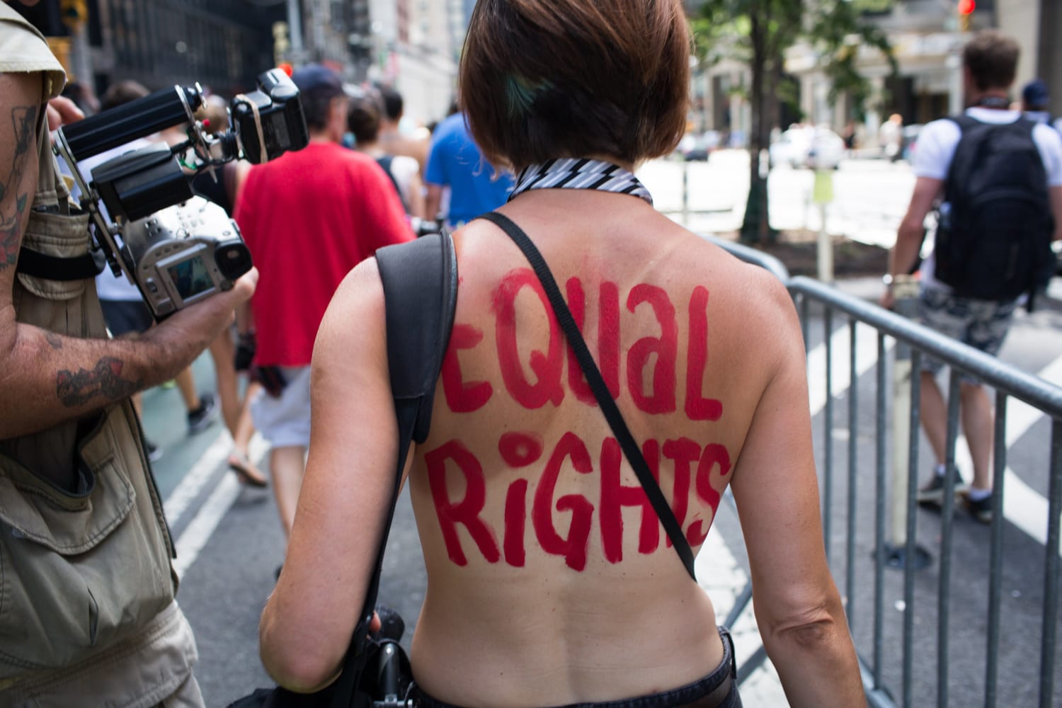 Women, and Men, Doff Their Shirts Around the World for 'Go Topless Day...