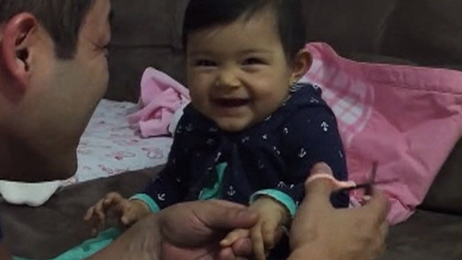 Nail Fail Adorable Baby Reacts To Father Clipping Her Nails
