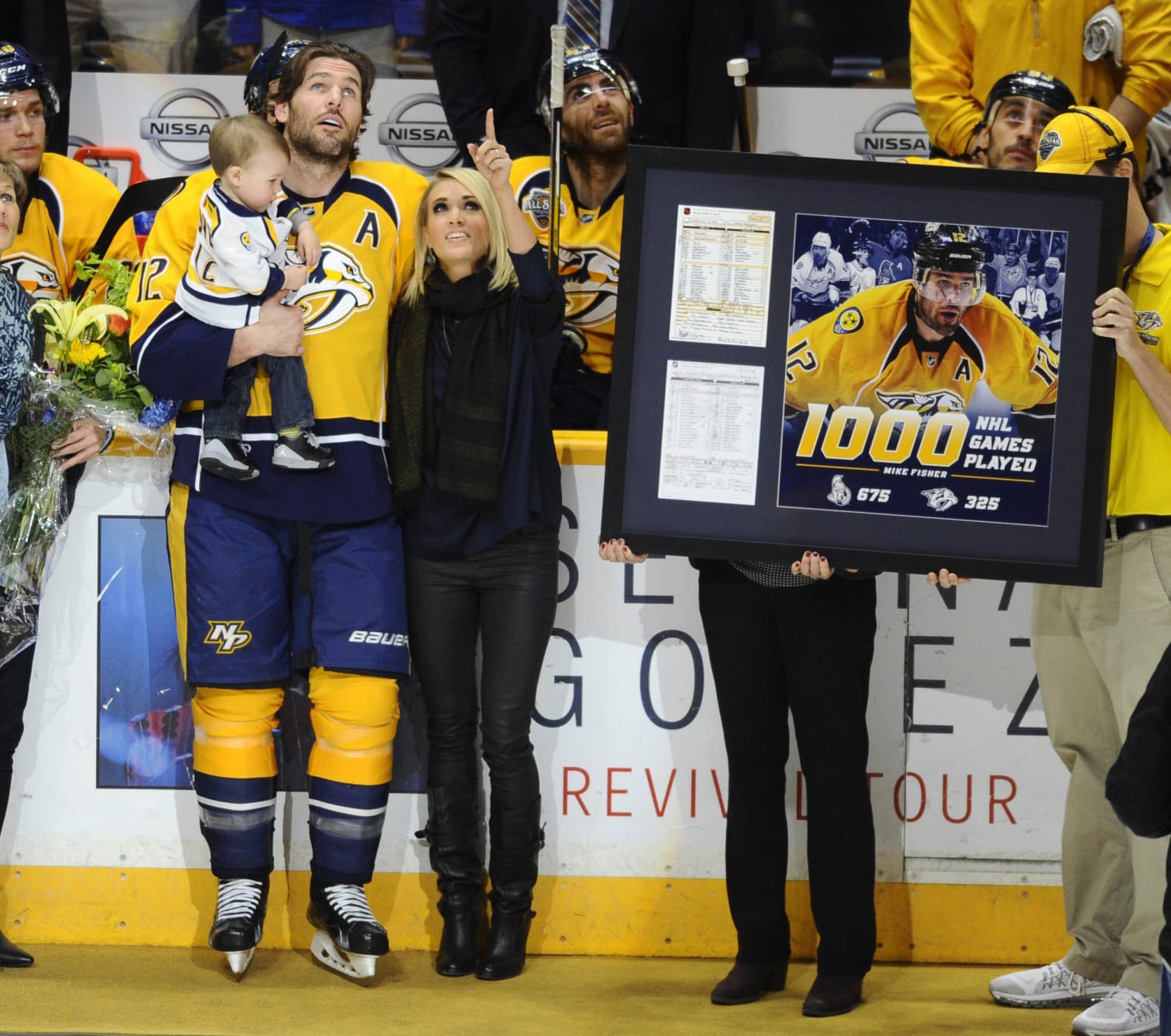 Carrie Underwood's Husband Mike Fisher and Son Isaiah Drop Puck at  Nashville Predators Game Sounds Like Nashville