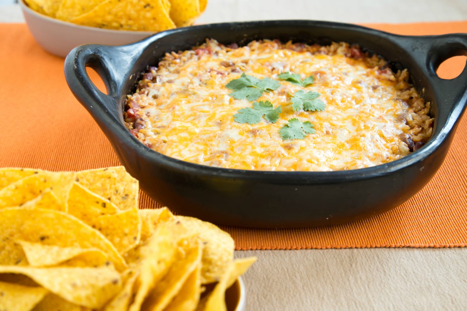 Feed a crowd with this cheesy scoop-and-serve taco casserole