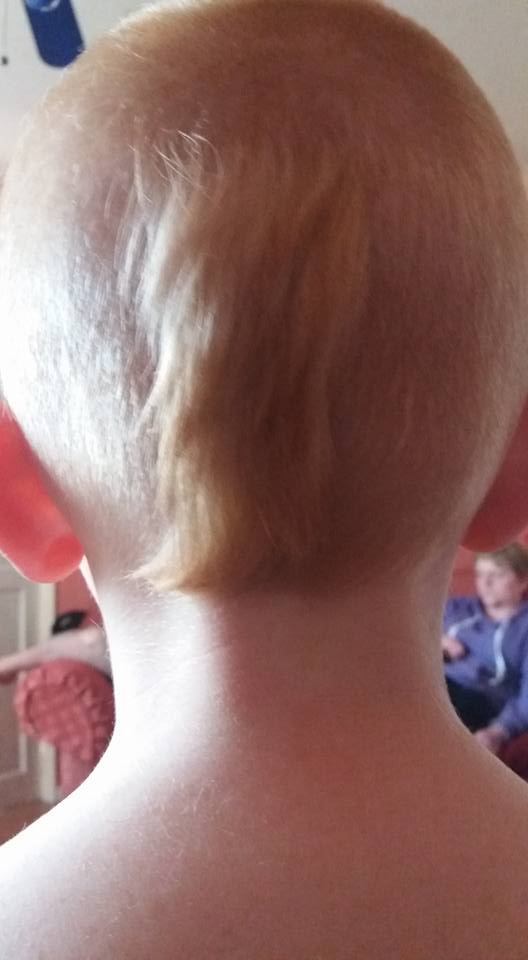 Boy asks uncle for haircut in the style of his bald neighbor