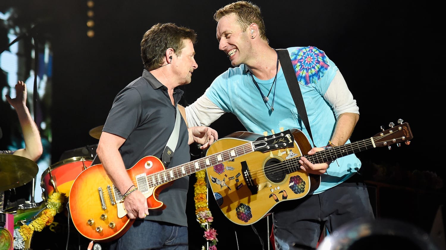 Michael j fox plays with coldplay