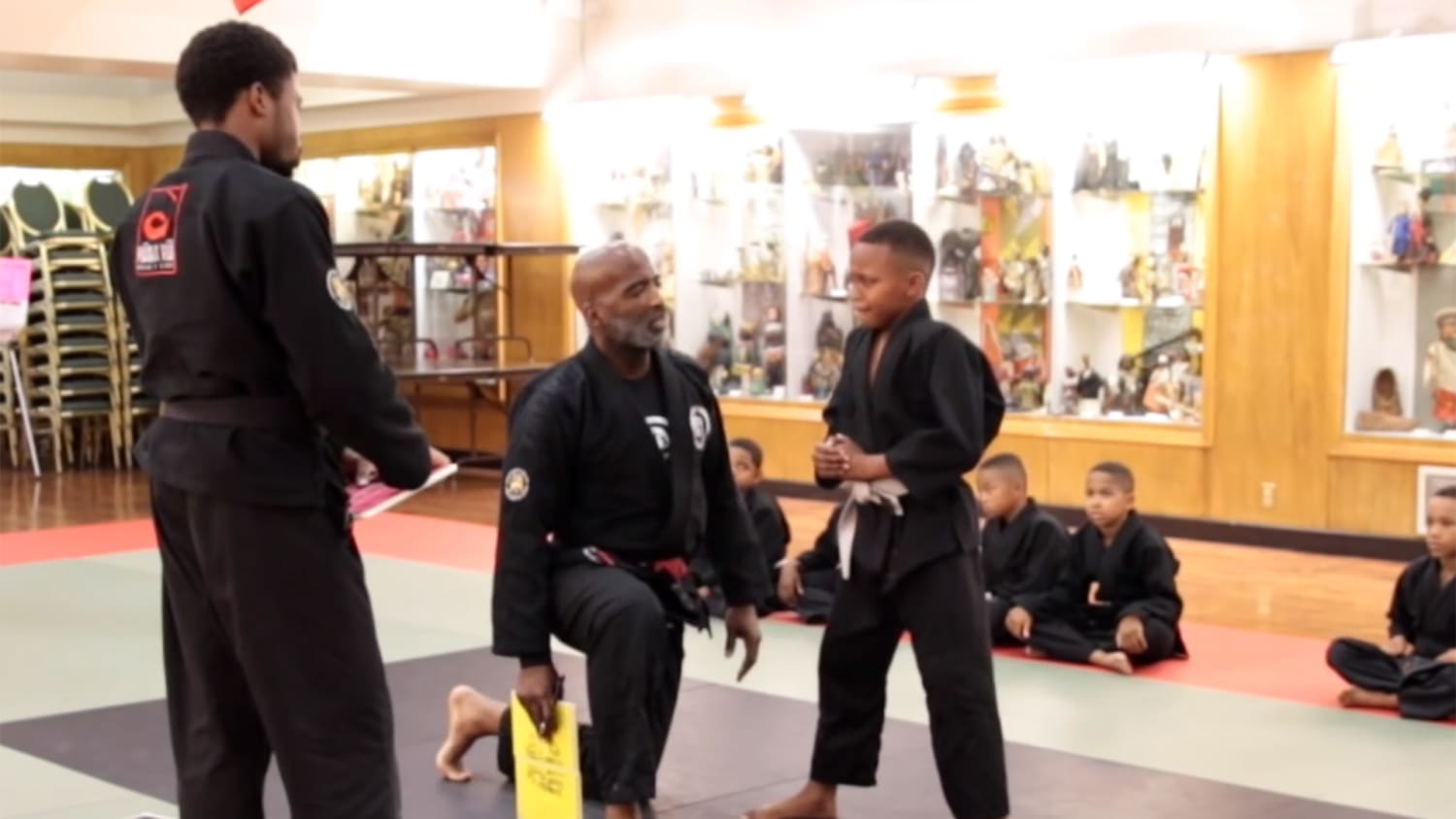Martial arts teacher consoles tearful boy, reminds us all 'it's OK