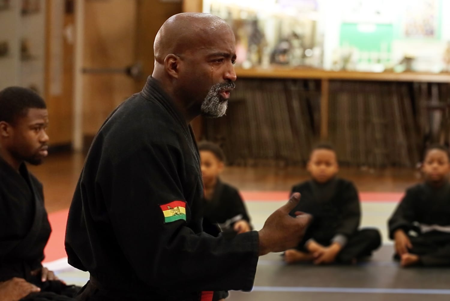 Martial arts teacher consoles tearful boy, reminds us all 'it's OK