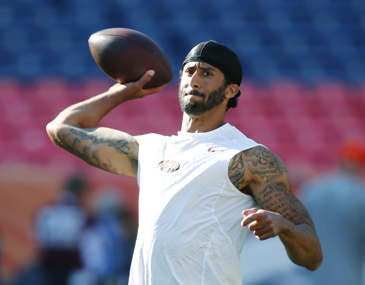 Colin Kaepernick, San Francisco 49ers QB, Sits Out National Anthem