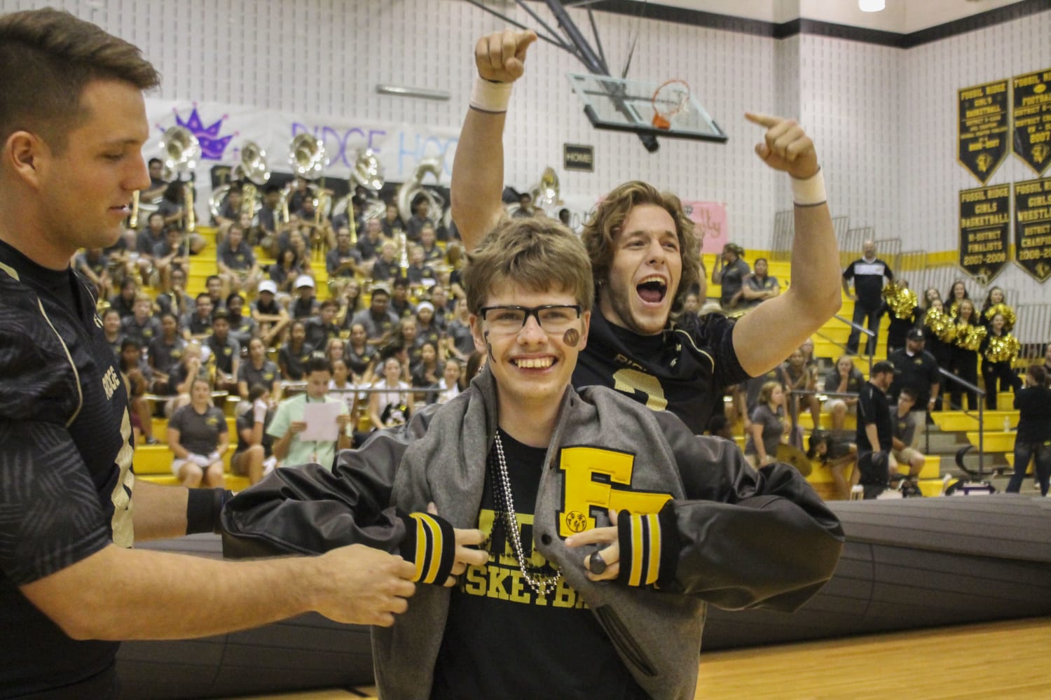 Homecoming king turns crown over to friend and runner-up with cerebral palsy