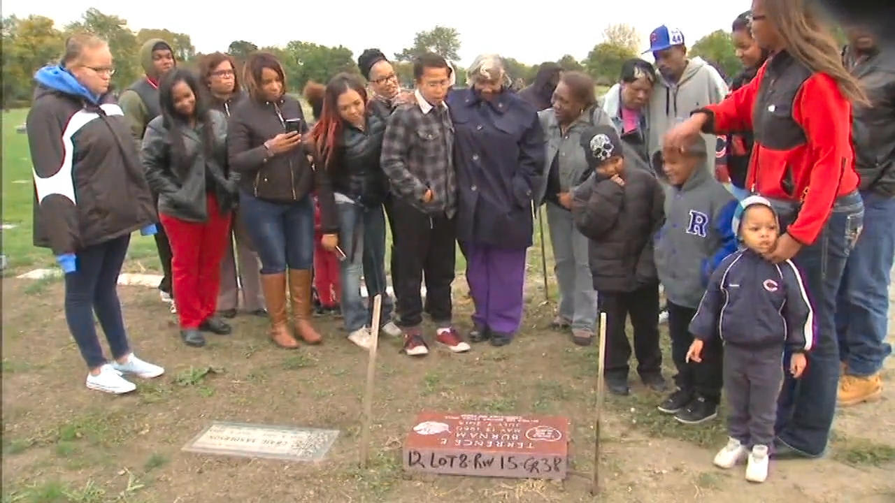 Boy mows lawns all summer to buy gravestone for father he never knew