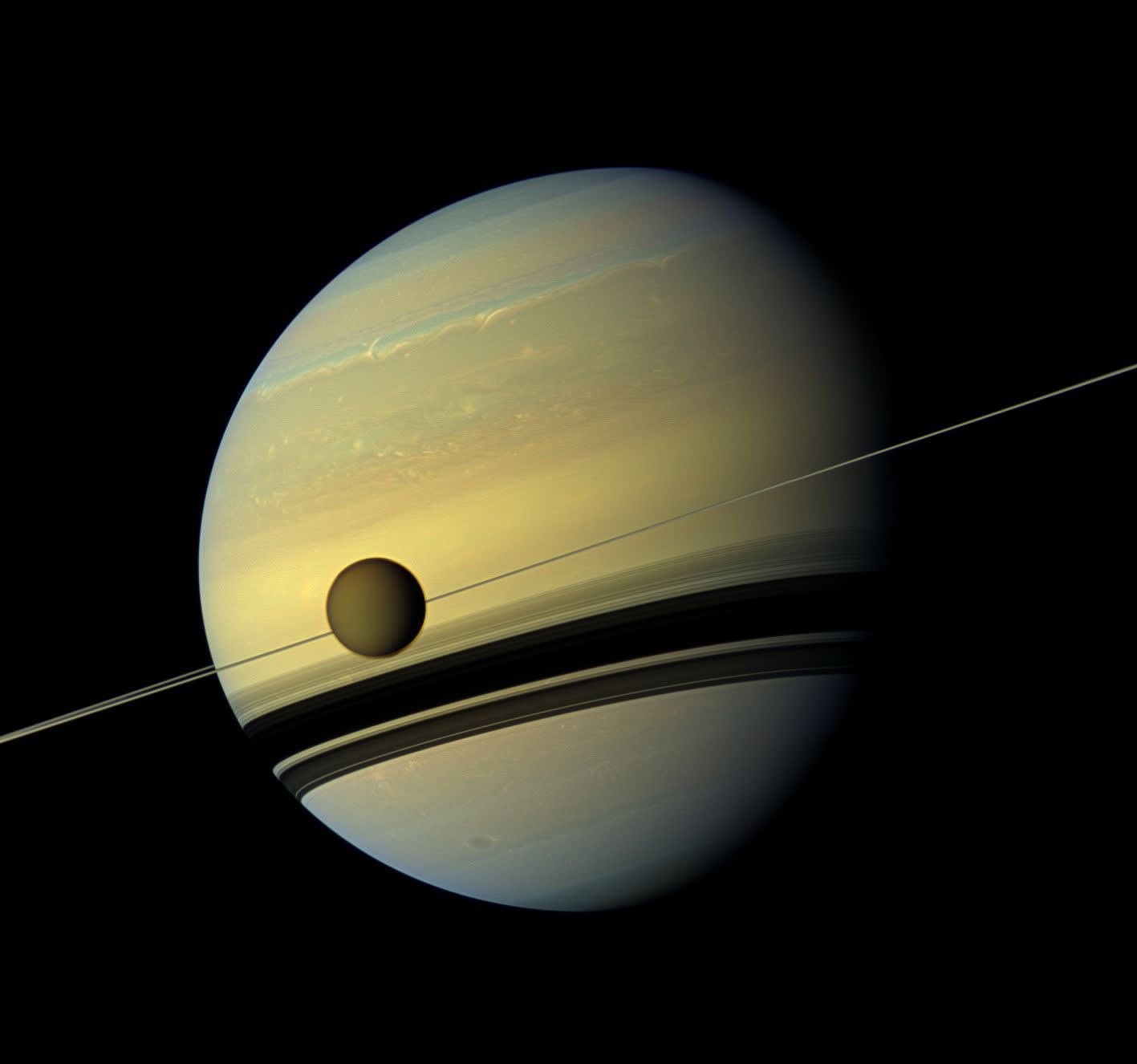 Saturn's rings may be the remnants of two moons that collided | TechSpot