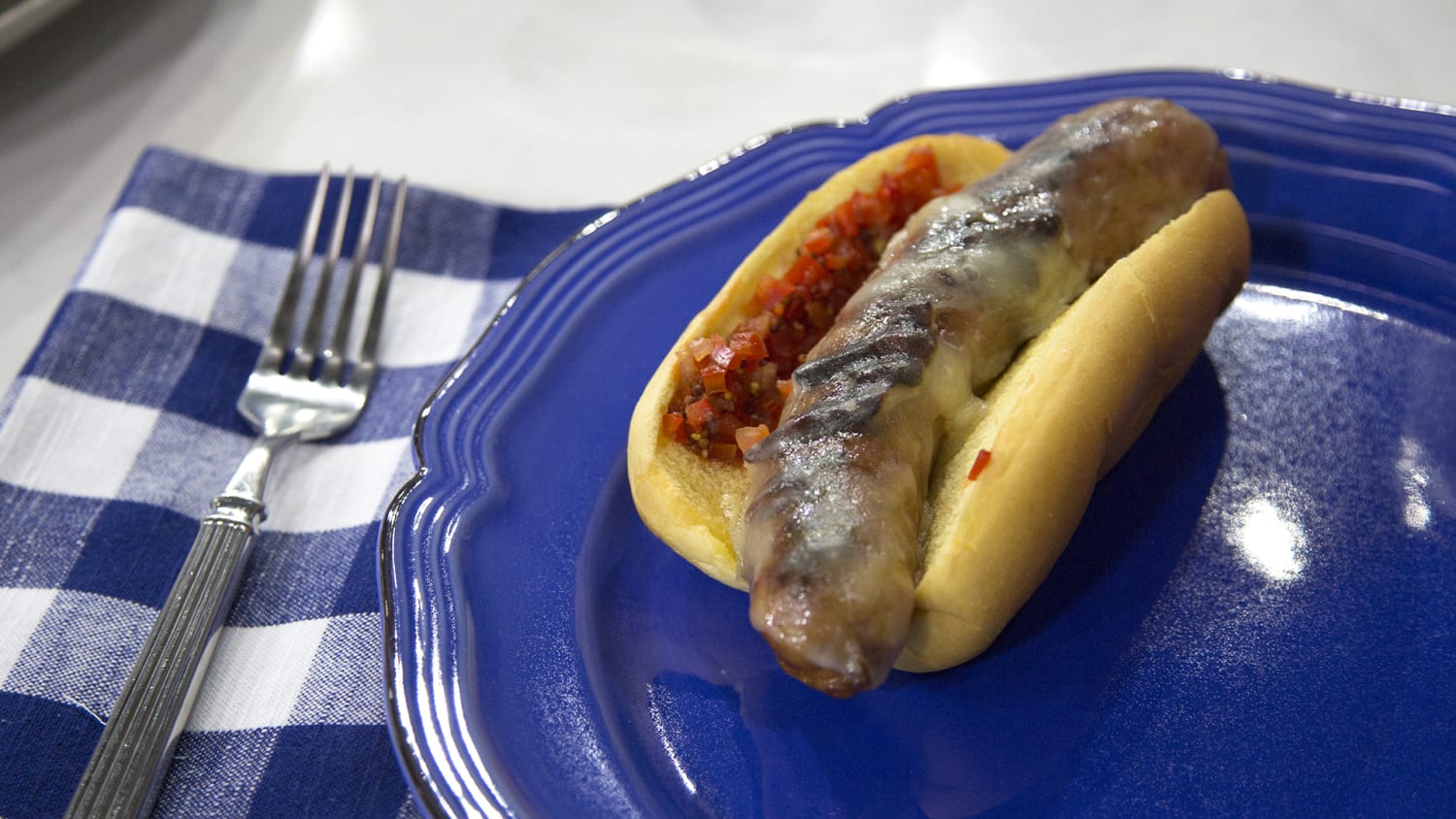 Hot dogs with sweet onion and capsicum relish
