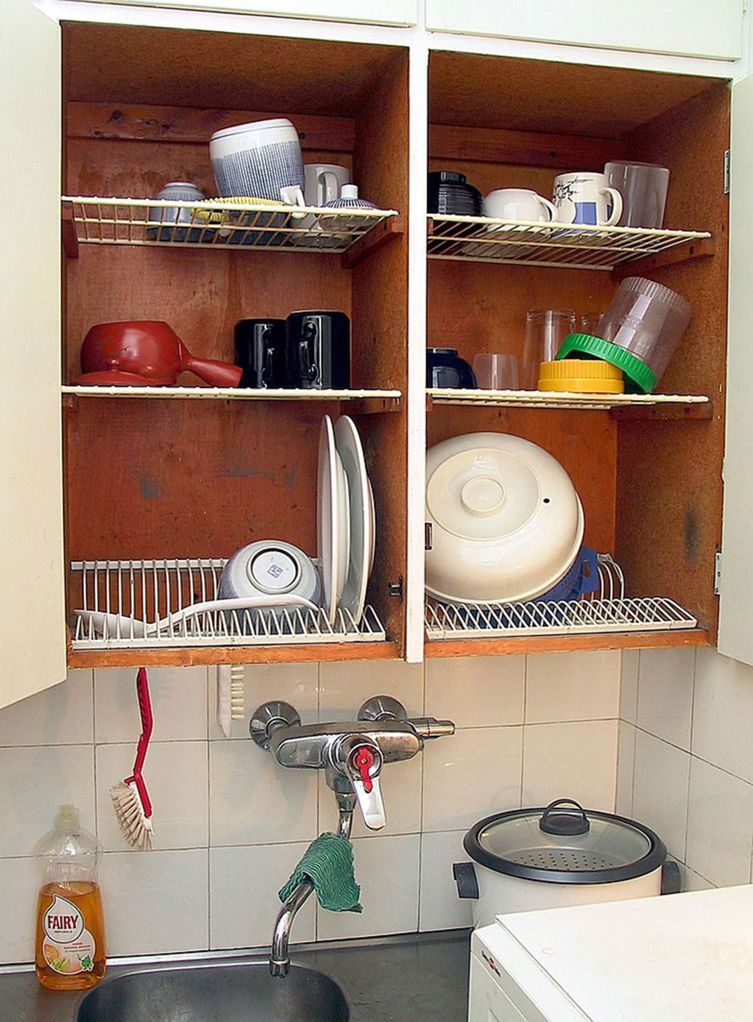 Drying Racks Above Sink Inside Kitchen Cabinet. Hidden Cabinet