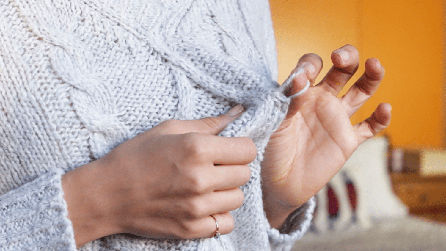 How to fix a sweater snag with an unlikely hair tool