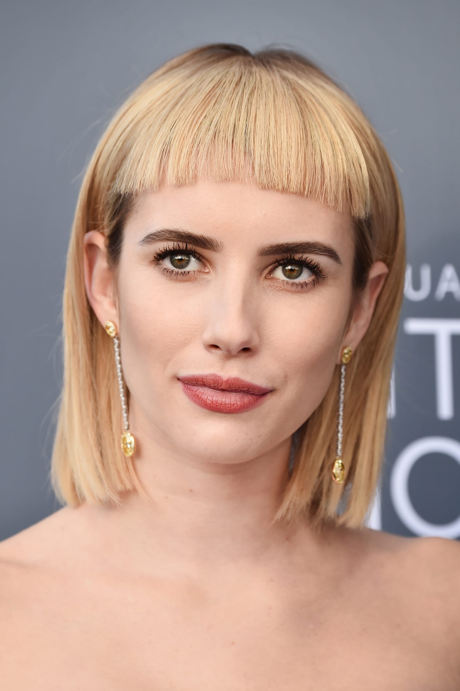 Image of Emma Roberts with a blunt long bob with bangs