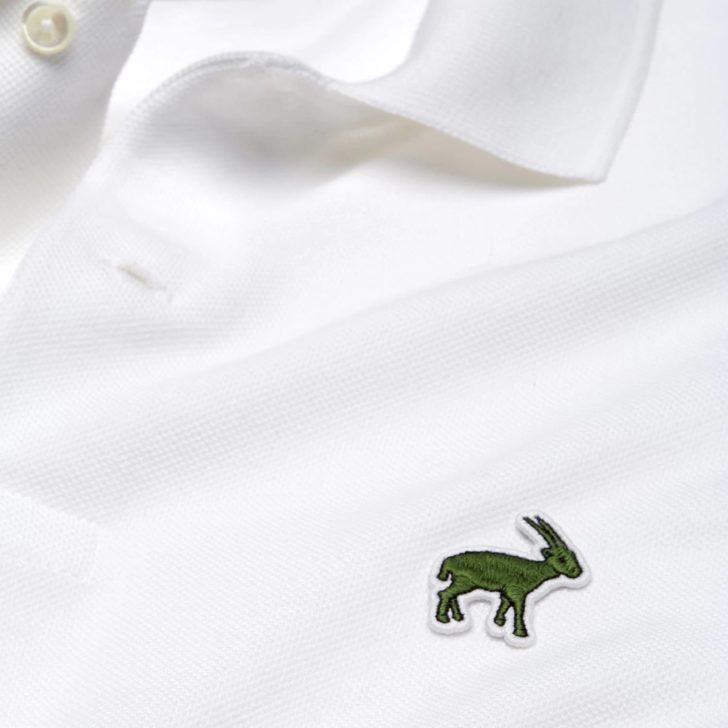 Lacoste replaces with endangered species